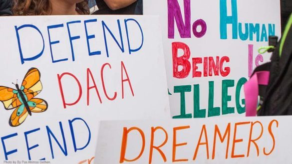 Poster boards that defend DACA.