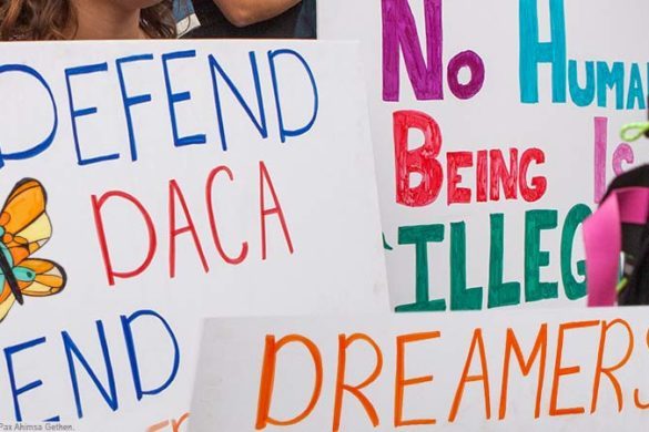 Poster boards that defend DACA.