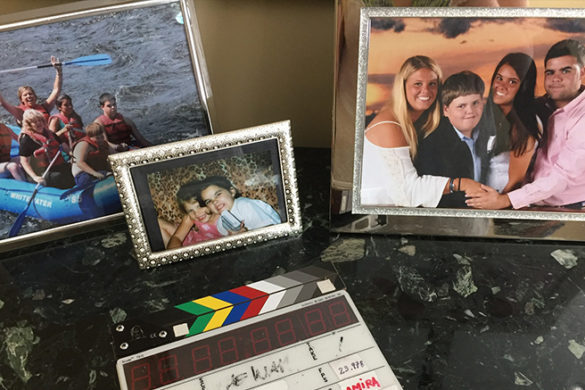 Family photographs sitting on a table.