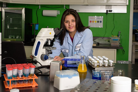 Female student working on a science project.