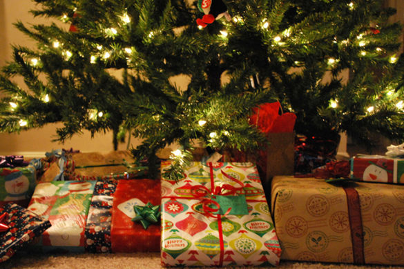 Christmas presents under a Christmas tree.