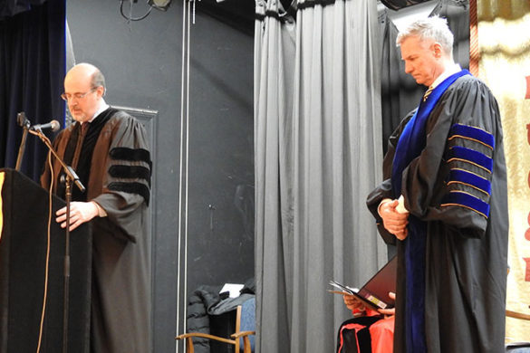 Two men on stage.