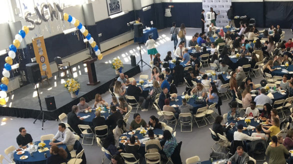 Overhead shot of students seated at tables.