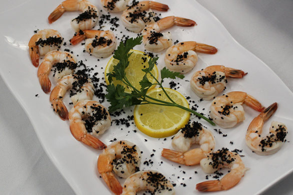 Shrimp coated in black ants.