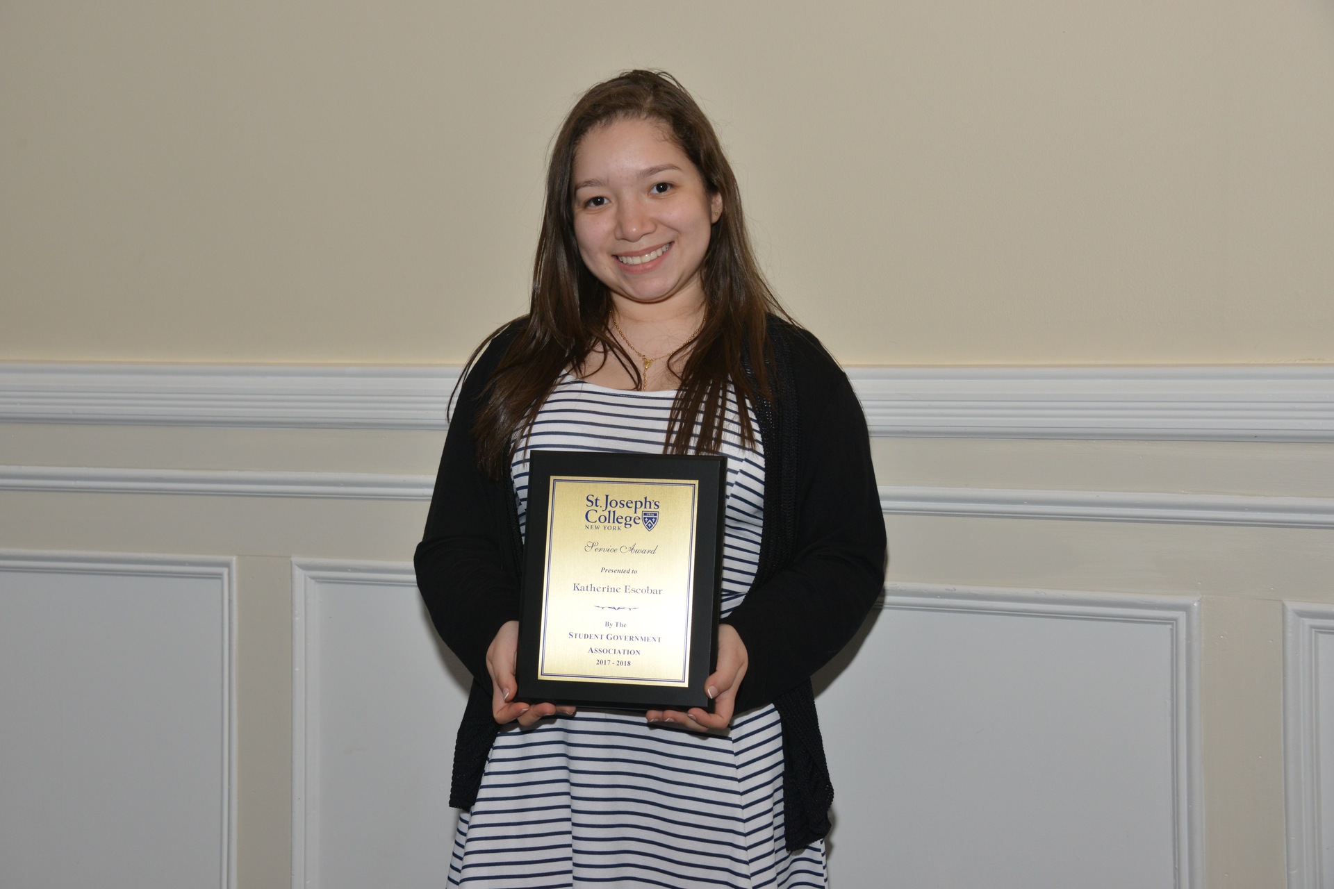 Katherine Escobar recognized for accomplishments.