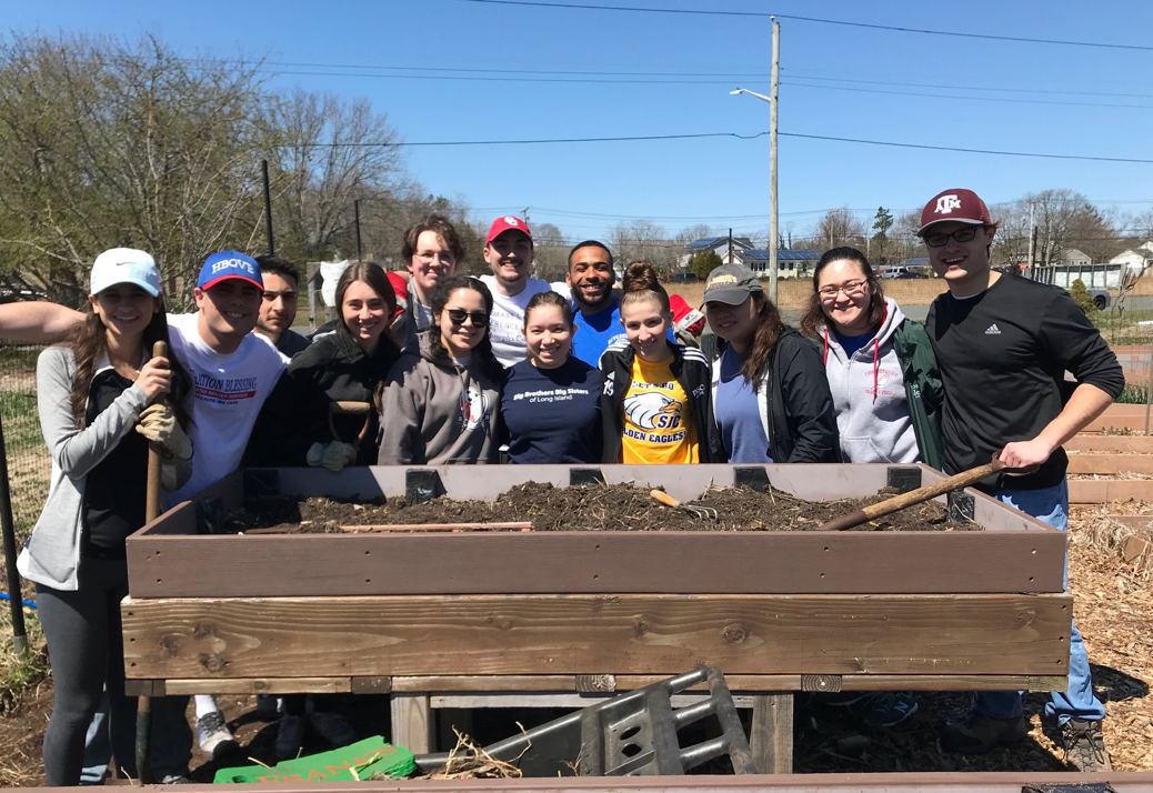 SJC students and staff volunteering on Earth Day 2018.