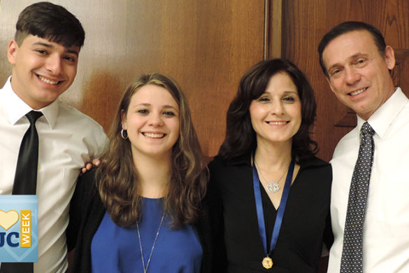 Cara (second to right) with her husband (right), daughter and son.