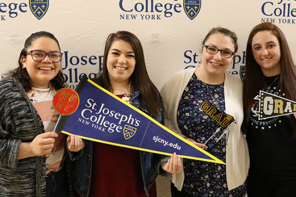 SJC Long Island seniors at Cap and Gown Pickup in 2019.