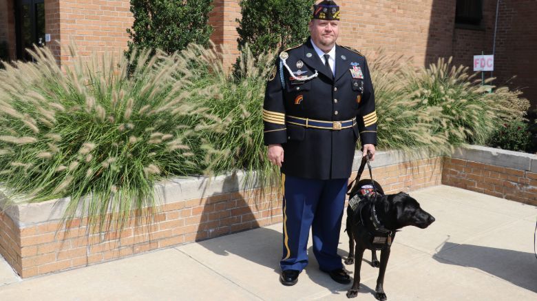 A service man and his dog Grunt.