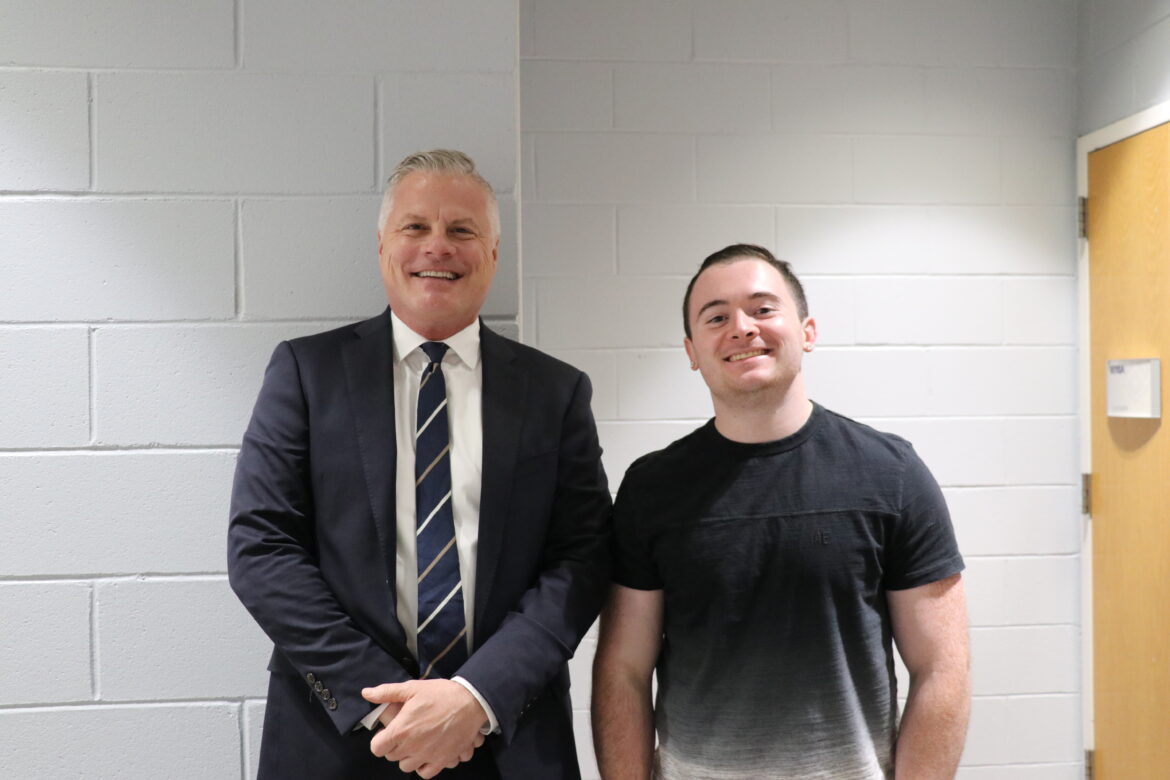 SJC Provost and Vice President for Academic Affairs Robert Riley, Ph.D., with scholarship recipient Ryan Forrester at the SJC Long Island event.