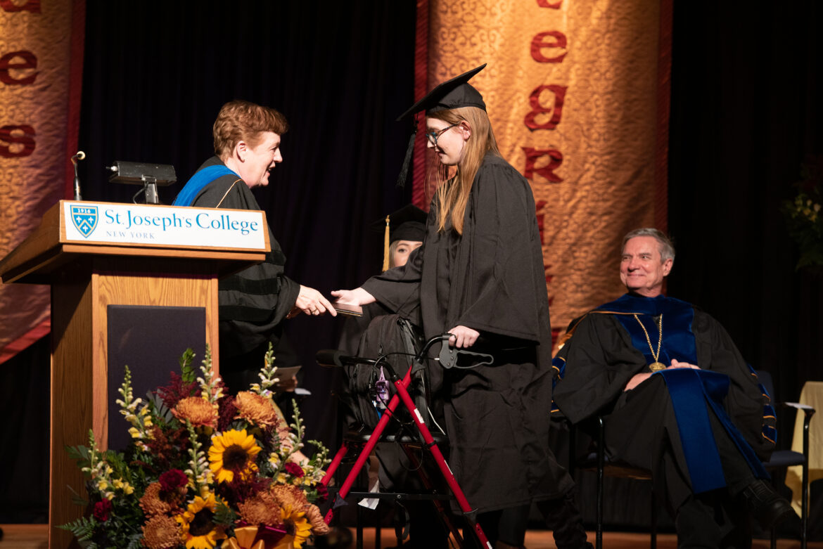Student receives award.