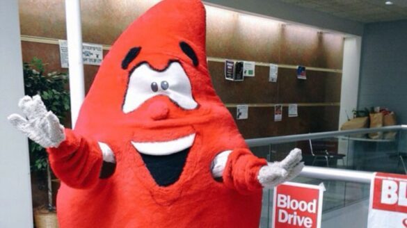 A person wearing a blood drop costume at one of SJC Long Island's blood drives.