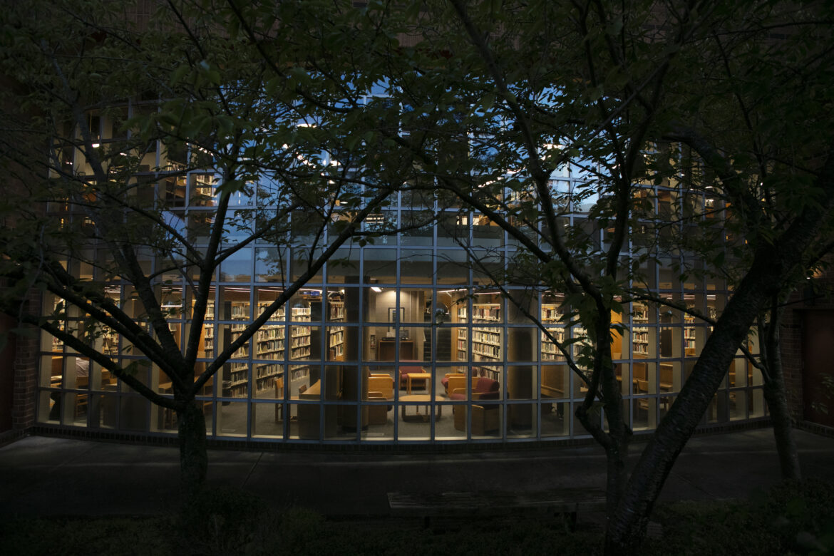 The floor-to-ceiling glass window on the side of the Callahan Library.