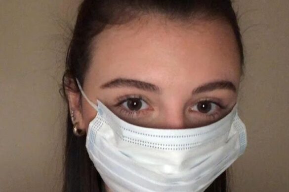Female student with surgical mask.