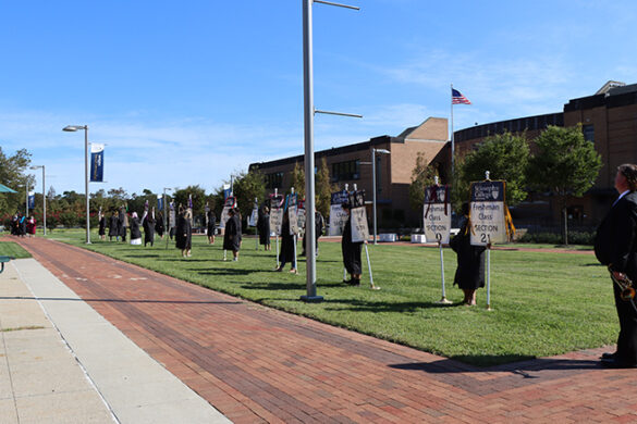 This year's Orientation team leaders line up outside to welcome new students during a virtual Investiture Ceremony.