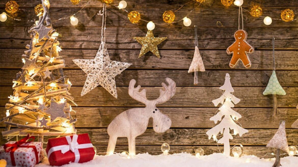 Stock photo of trees, a moose, and some presents.