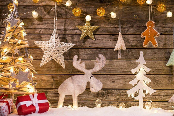 Stock photo of trees, a moose, and some presents.