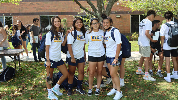Members of the women's soccer team at the SJC Long Island Welcome Back Barbecue.