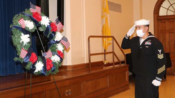 U.S. Navy veteran salutes