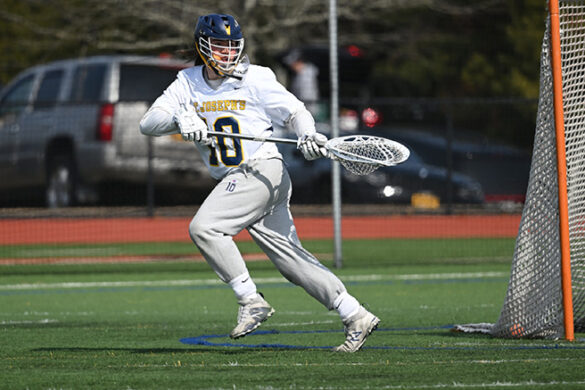 Andrew Brust playing lacrosse.