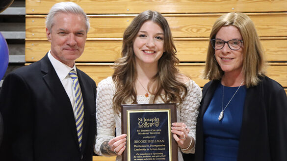 Brooke Shellman with Dr. Boomgaarden and Board member Susan Somerville after receiving the award.