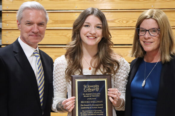 Brooke Shellman with Dr. Boomgaarden and Board member Susan Somerville after receiving the award.