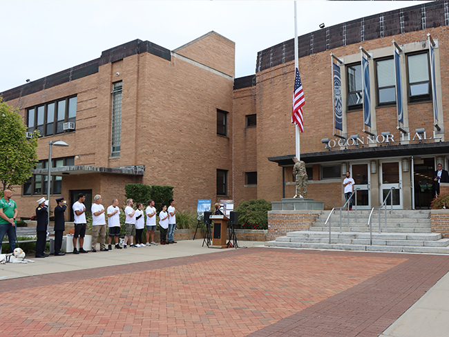 Changing of the Flag Ceremony at the Long Island Campus.