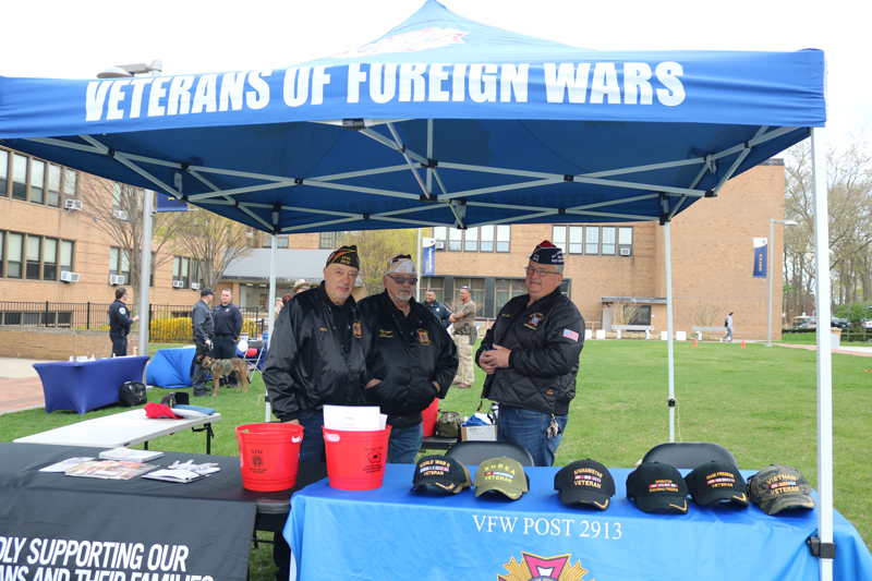 Members of the VFW set up a booth.