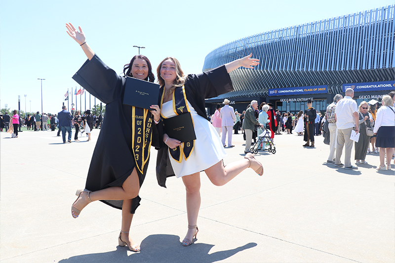 Students celebrating graduating.