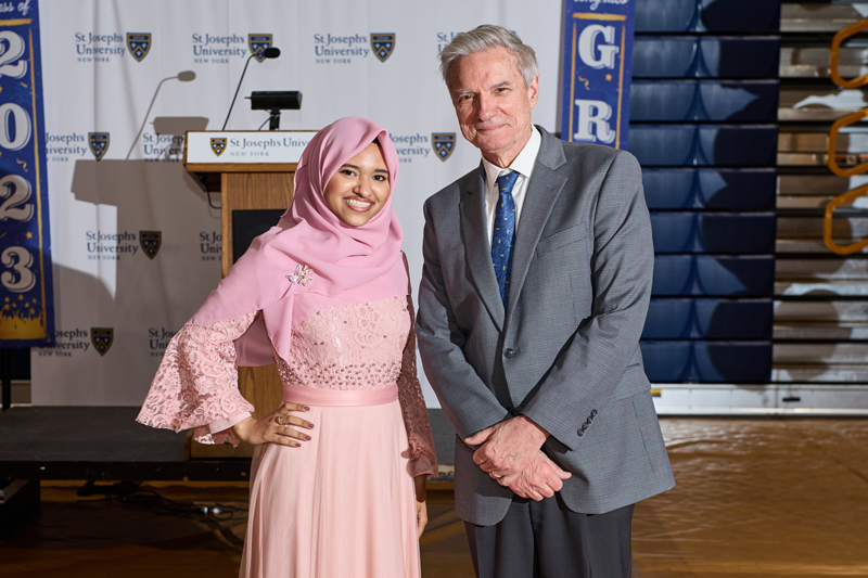Asma Hosein with President Boomgaarden.