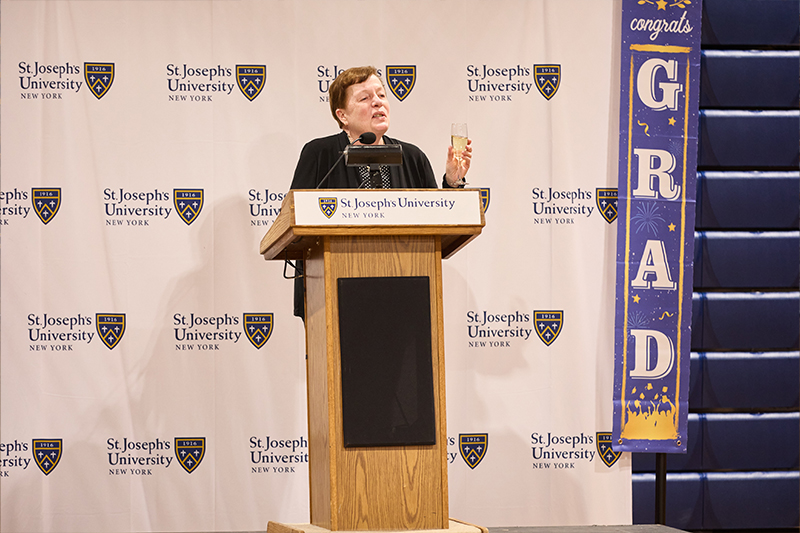 Dr. Eileen White Jahn, executive dean, leading the Toast to the Graduates.