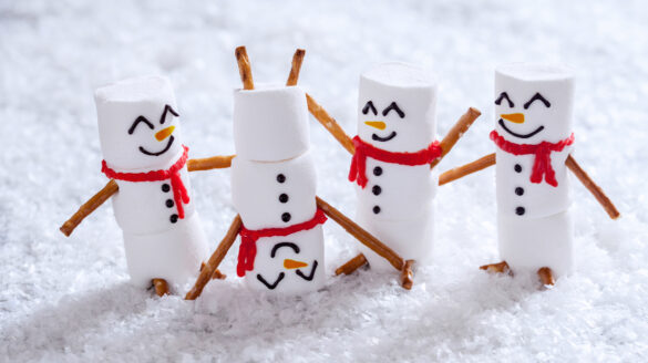 Festive holiday picture featuring food snowmen.