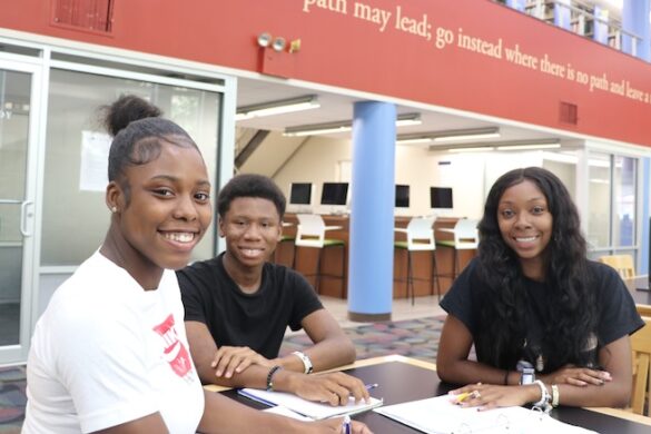 Students seated in library.