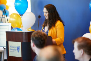 Lisa Galasso speaking at the DJ Schiulaz Accessibility Ramp ribbon cutting ceremony.