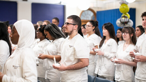 Nursing_bk4 Nursing students holding candles