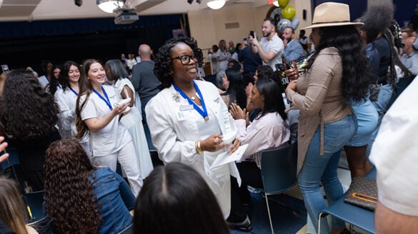 nursing_bk3 Nursing students smiling with their friends and family