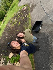 Two students smiling for the camera.